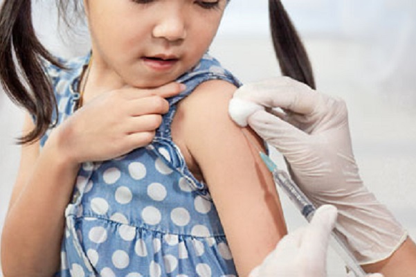 Child receiving a vaccine